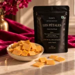 Lynn's Les Pétales pouch with a bowl of mango and jackfruit fruit petals