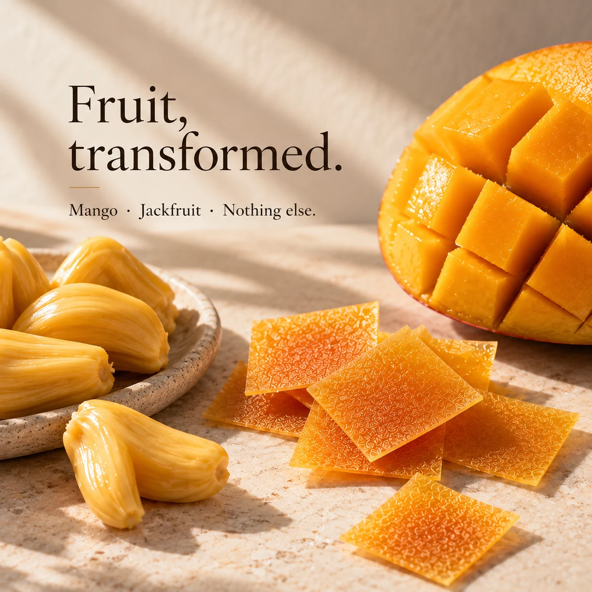 Les Pétales fruit petals beside fresh mango and jackfruit